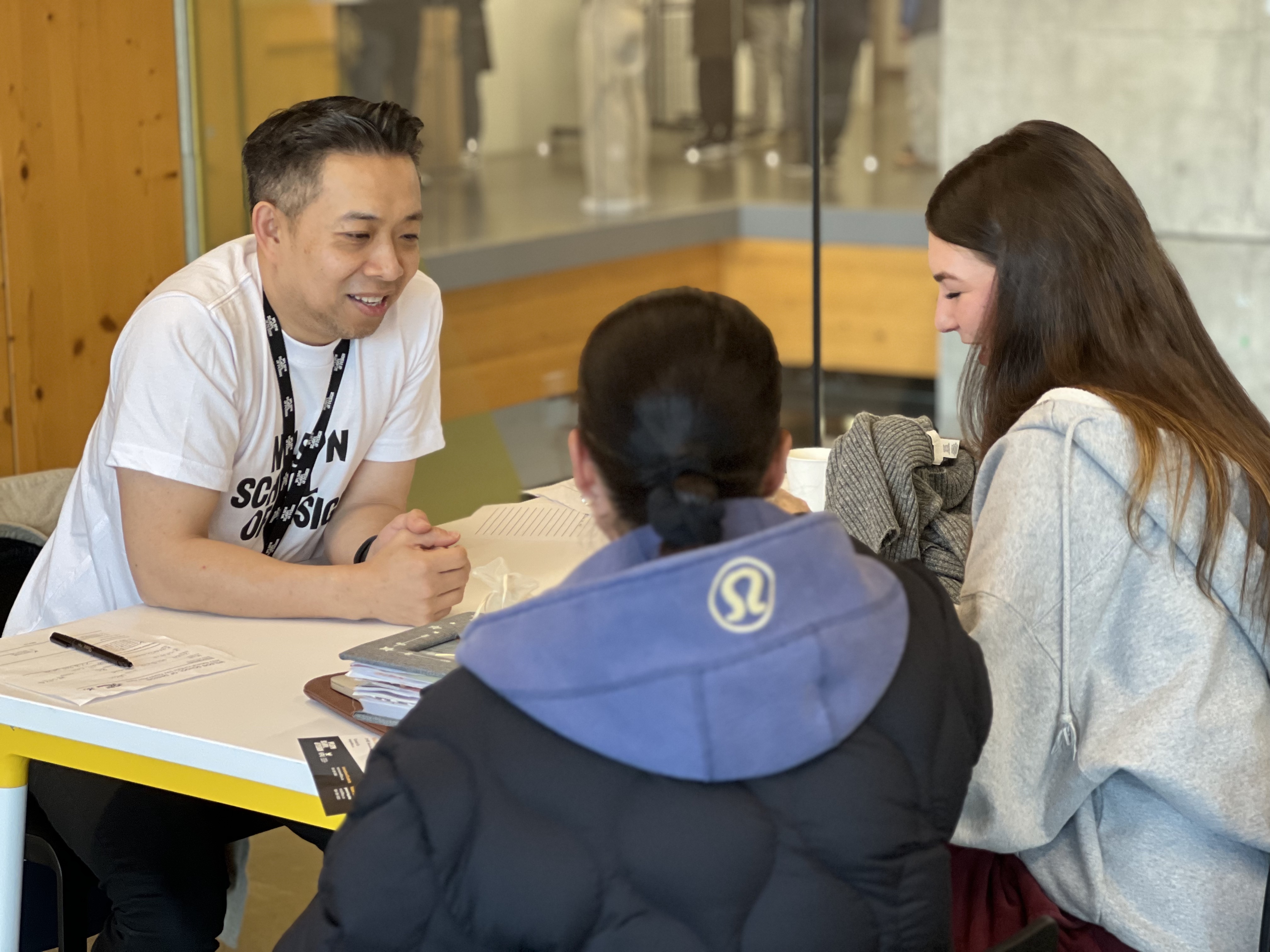 Three people collaborating at a table