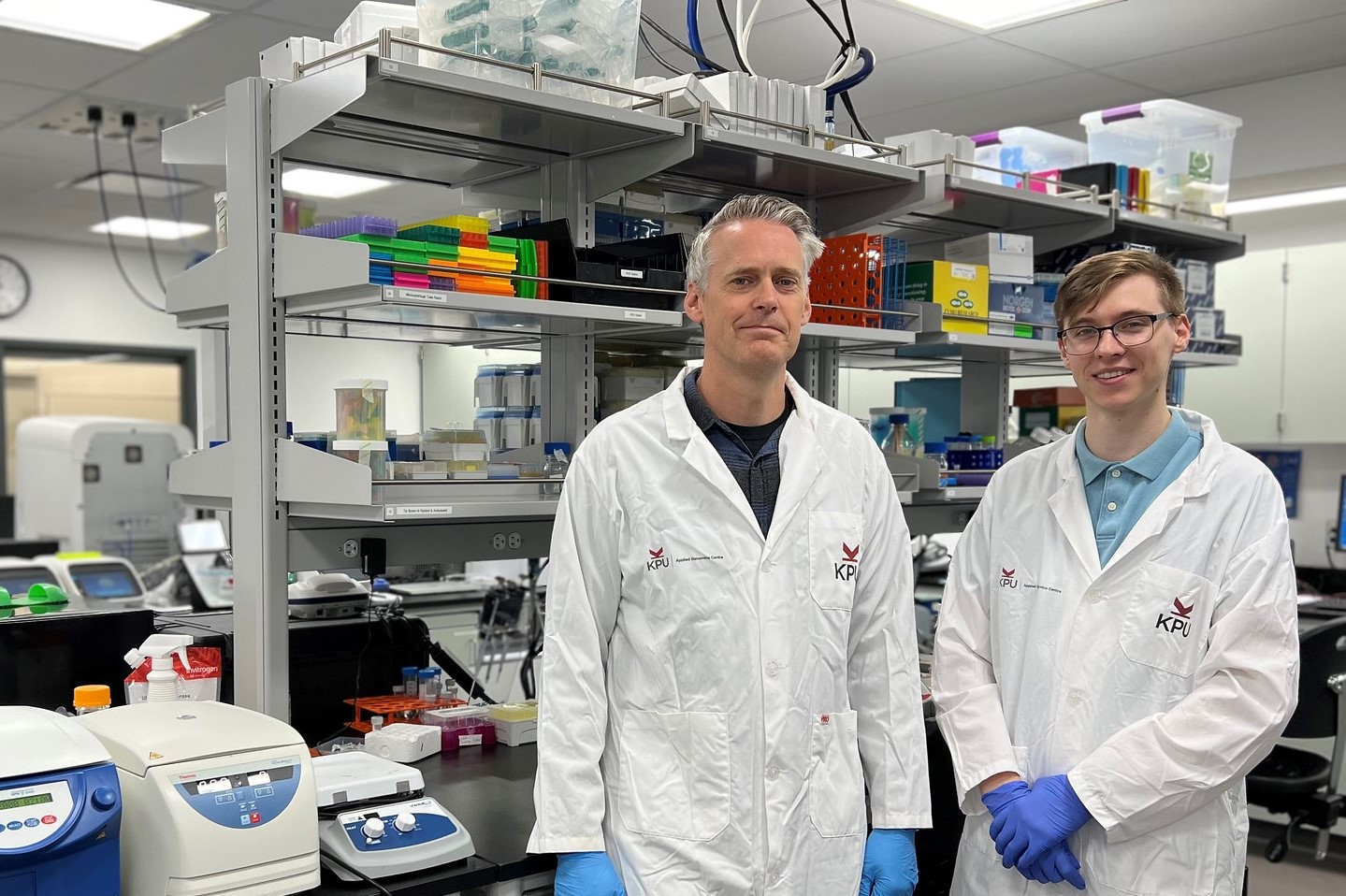 Dr. Paul Adams and Robert J. Wester at KPU's Applied Genomic Centre.