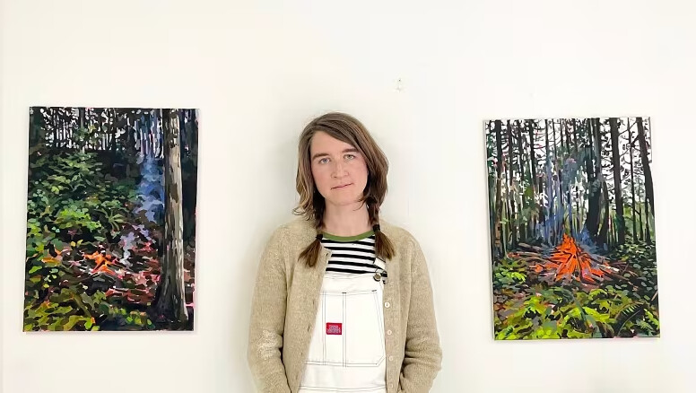 KPU instructor Liz Toohey-Wiese next to her work.