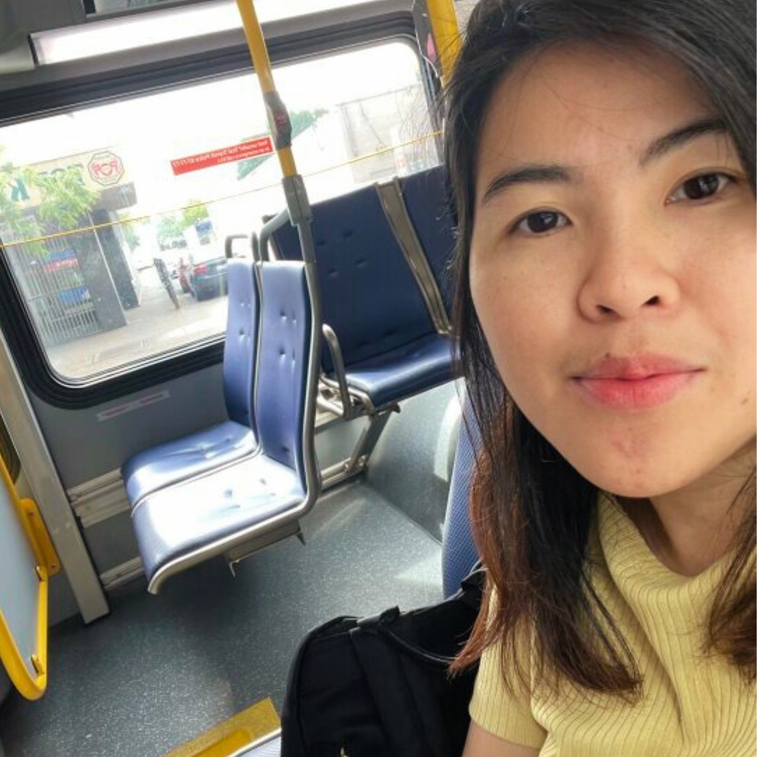 women taking selfie on bus