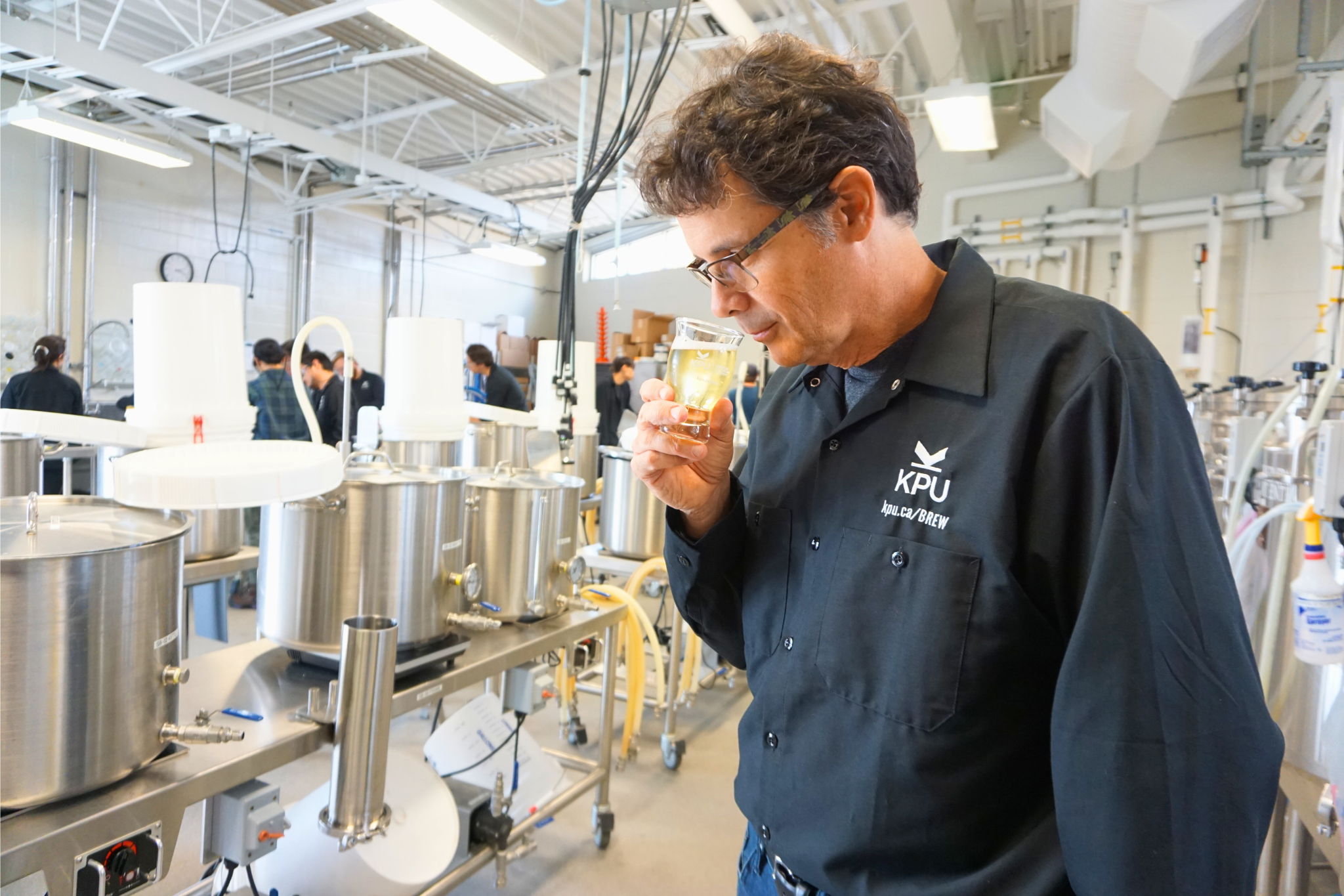 KPU brewing and brewery operations instructor, Alek Egi, demonstrates sensory tasting in the KPU Brew Lab.