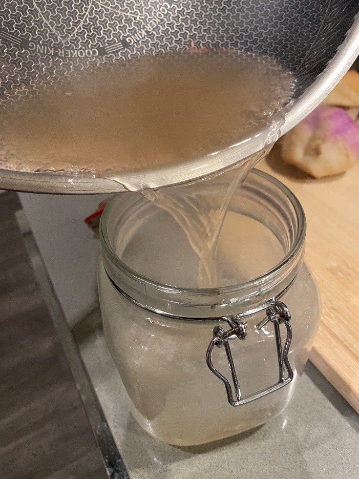 pour juice into jar
