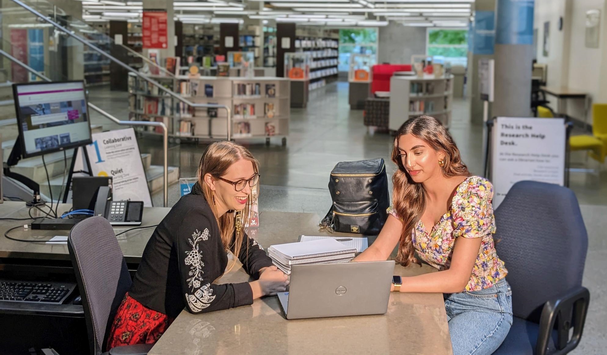 two people in the library