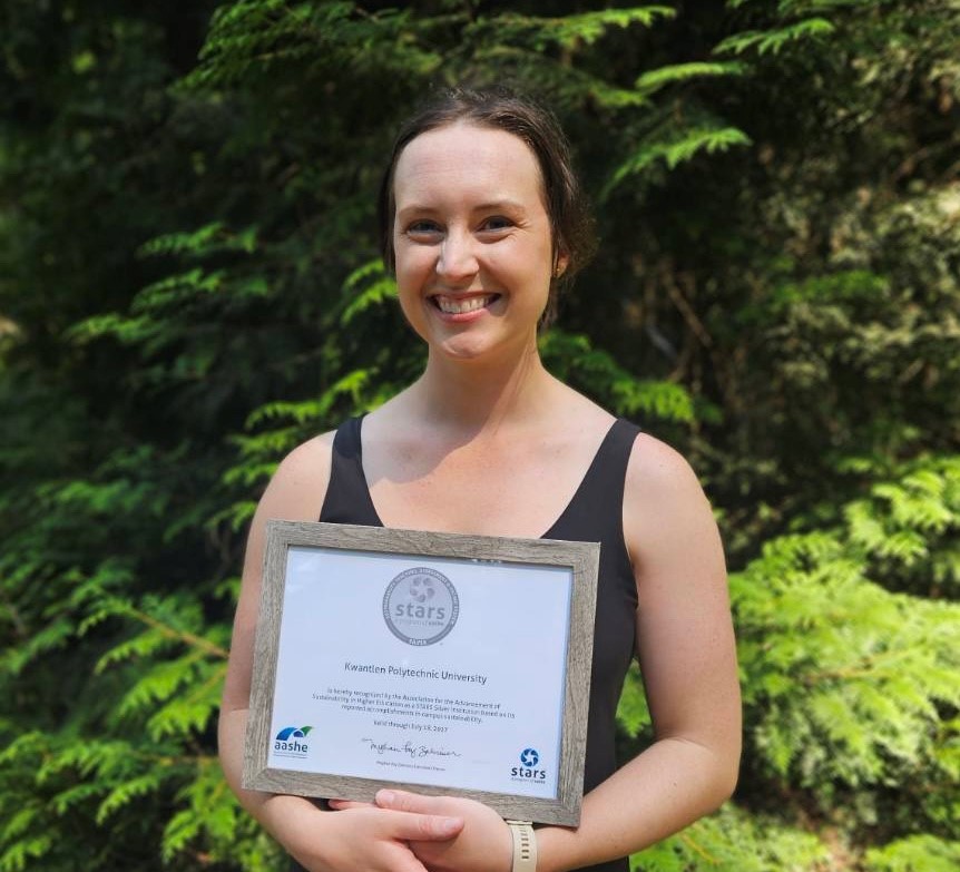 KPU Sustainability Specialist Alicia Gowan holding KPU’s first STARS certificate. 