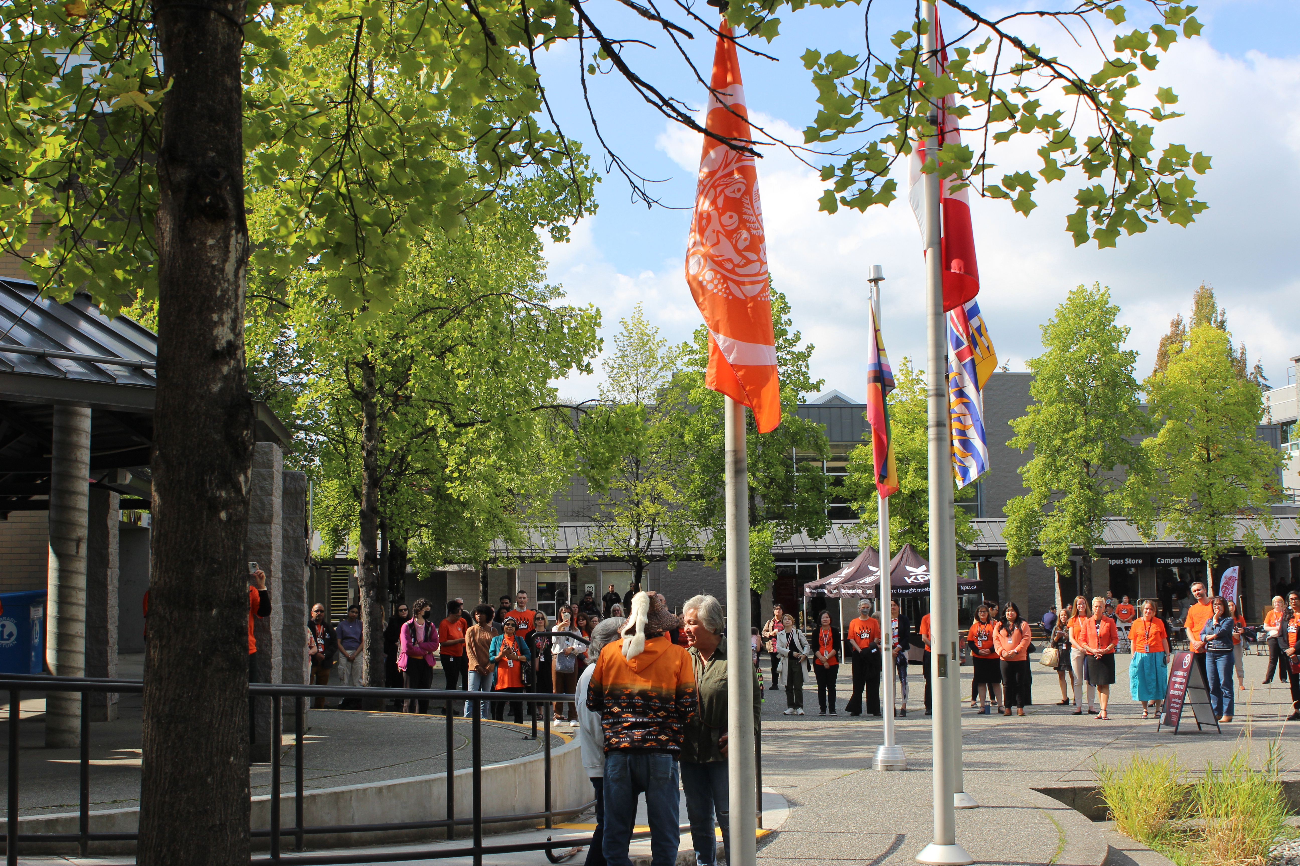 Reconciliation flag raising ceremony at KPU Surrey in 2024