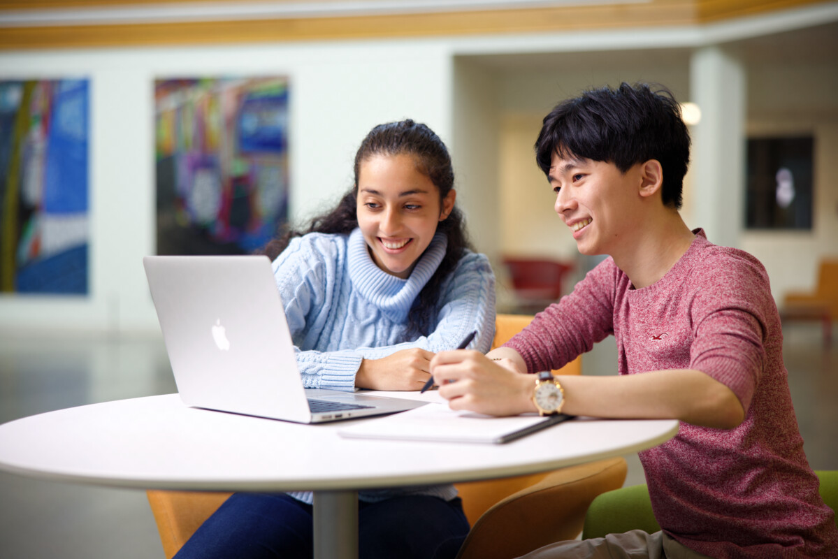 Photo of students on laptop