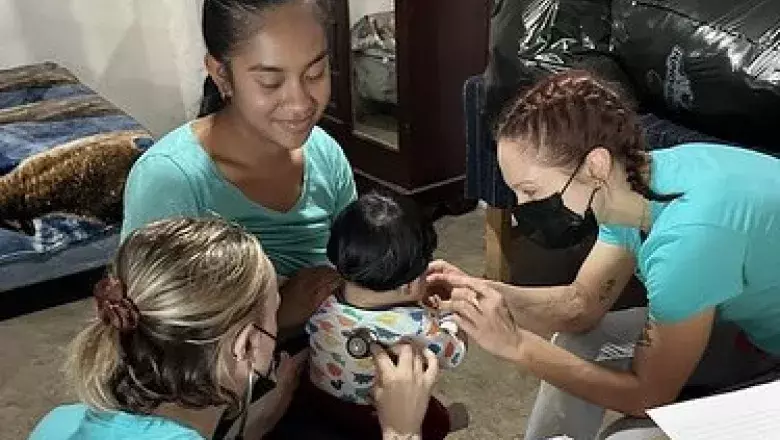 KPU Nursing students with child 