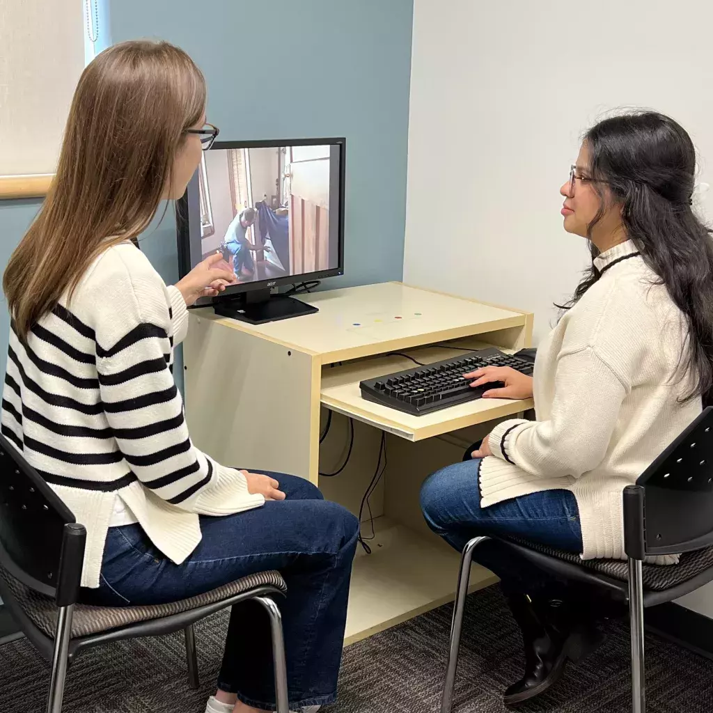 Student researchers Hanna Erceg (left) and Arshnoor (right) conducting the study at KPU's Lifespan Cognition Lab.