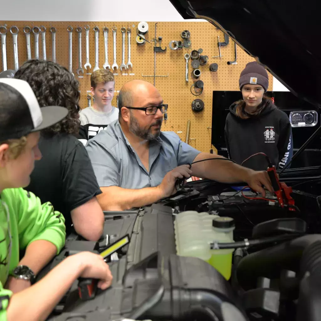 Students get a quick lesson on batteries in automotive at KPU Tech. 