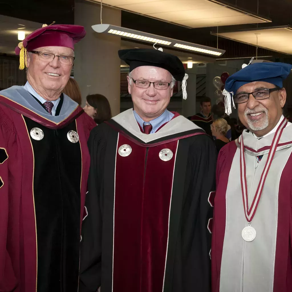 (From left) KPU Chancellor Dr. George Melville with President and Vice-Chancellor Dr. Alan Davis, and honorary degree recipient Arvinder Bubber, who served the university for six years as its first chancellor.