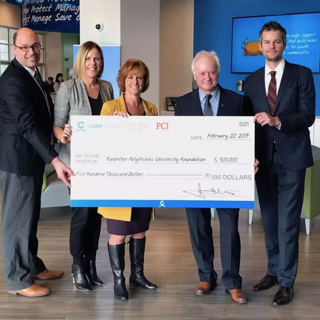 Coast Capital Savings hands $500,000 cheque to Dr. Alan Davis, Steve Lewarne and Marlyn Graziano as they donate to support Surrey students at KPU.