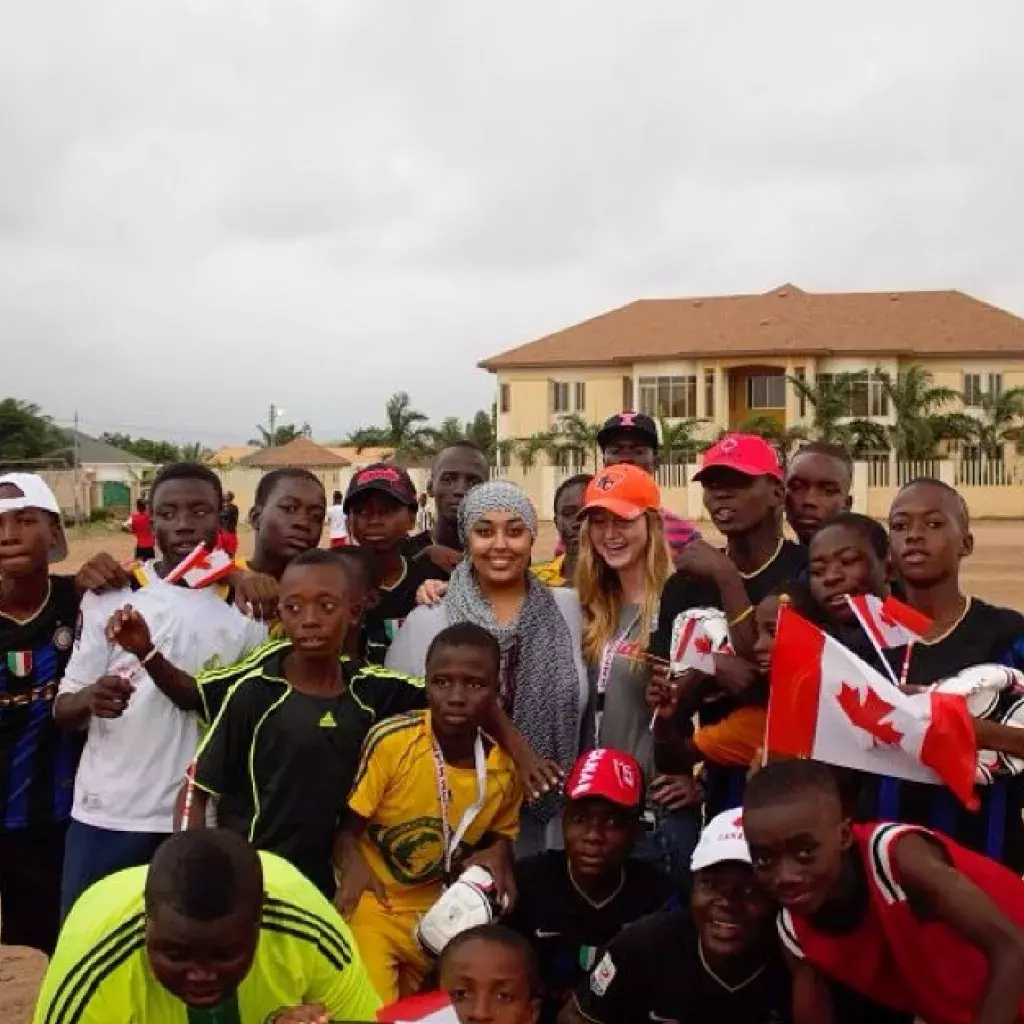 KPU arts student Ayesha Khan (centre, left) with peer Emma Cleveland at their multi-community soccer tournament in Ghana.
