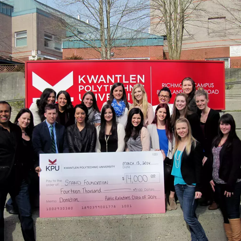 The Kwantlen Polytechnic University public relations students behind the Growth Gala show off the amount they raised for STAND Foundation at KPU Richmond.