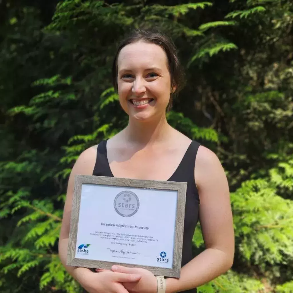 KPU Sustainability Specialist Alicia Gowan holding KPU’s first STARS certificate. 