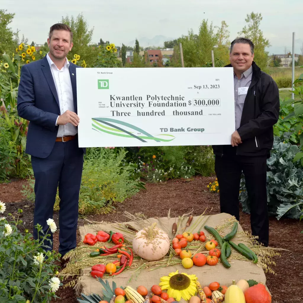 Tony Mauro of TD Bank Group, presents a $300,000 donation to KPU Farm on Sept. 13, received by Randall Heidt, Vice-President, External Affairs at KPU. 