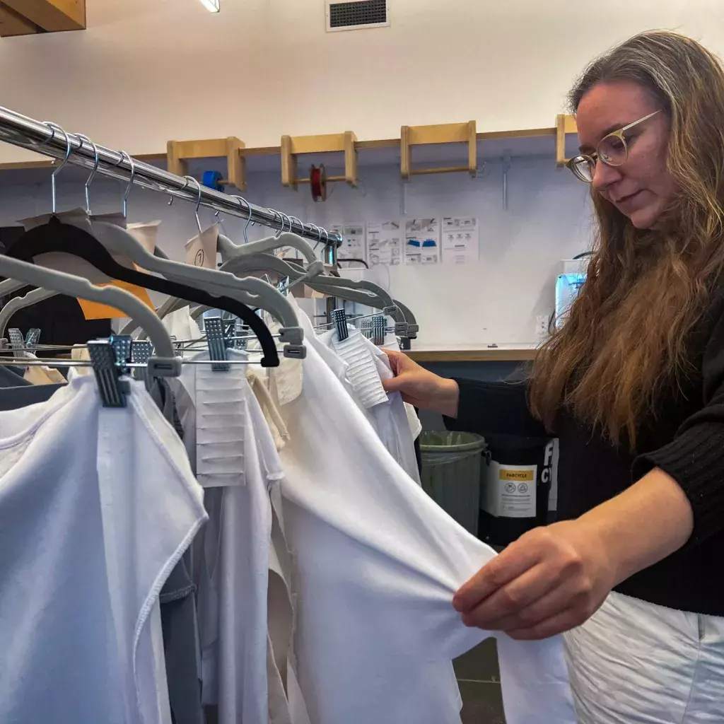 KPU researcher Stephanie Phillips tests T-shirt quality.