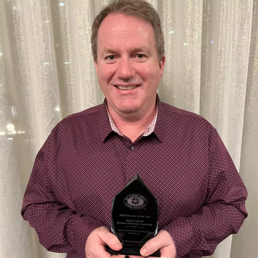 Jamie Lamont holding his award.