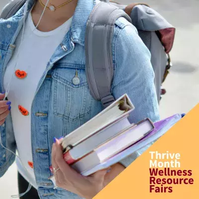 Thrive Month Resource Fair Image - Student holding books 